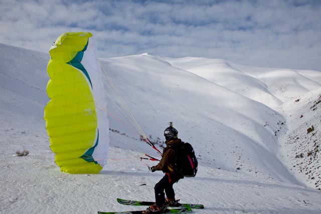 pascal kiting his speedwing back up tp the top for another flight.