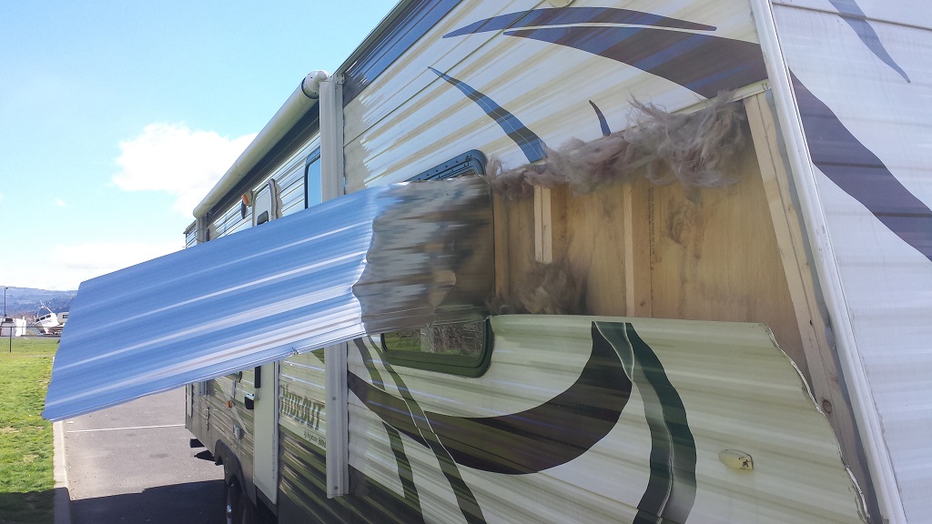 Wind found a way in through the seams and blew out a panel.  BE AWARE OF WIND ENTERING YOUR TRAILER.