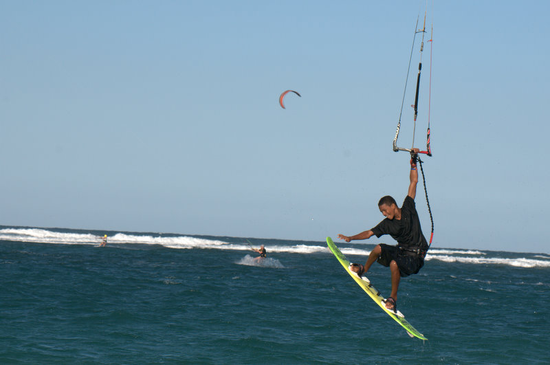 This kid rips and smiles all the time!  I saw some 720 double handle passes that he landed - 10 ft from shore!