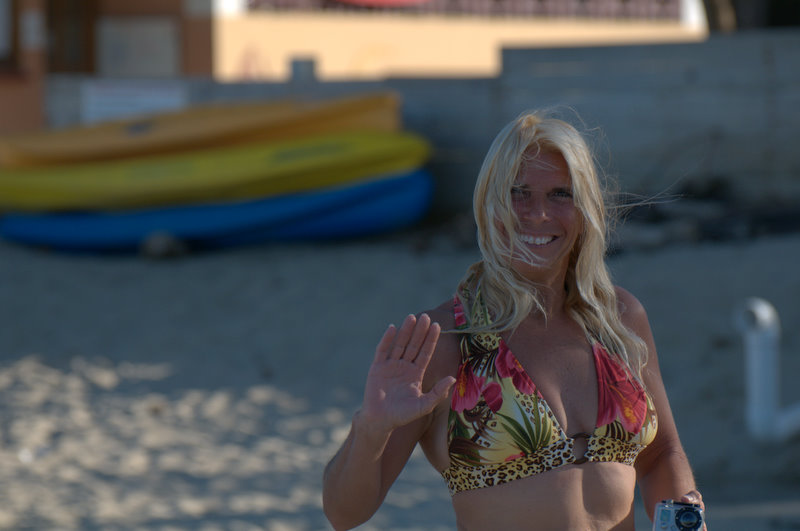 Carol walking the beach.