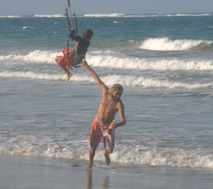 Grom flying Yanni back upwind for his next jump.