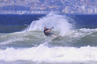 Anthony Berzack riding the waves