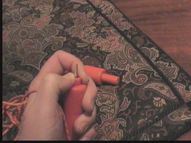 As pressure is applied, the outer covering retracts to reveal the picks. Also a useful tool in case of bear attacks, or if KiteMe is in the area.