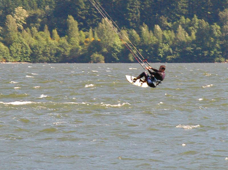 Feeling pressure to perform for the camera - Carl throws a back-roll kite-loop.  Notice - lines aren't crossed.