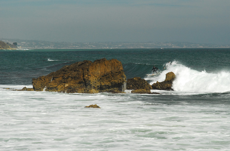 NOT me - we surf around the rocks, and it's the leash that gets ya
