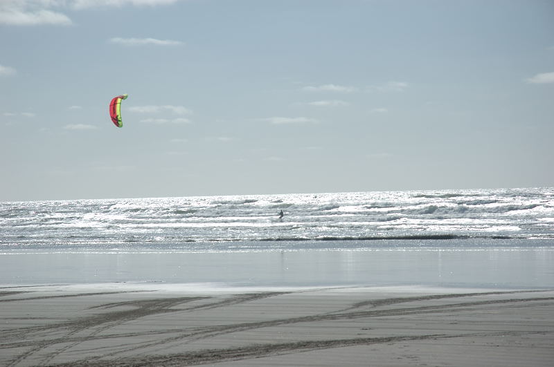 Me getting some action on the skimboard.  After four hours of trying, I finally got a mad slash at a wave.