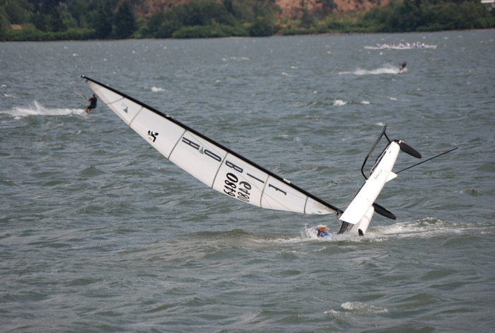 Hobie man gets wet.  (They tip in slow motion compared to the fast kb crashes.)
