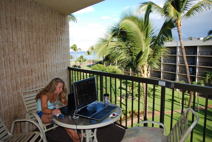 Becca doing internet school this morning.  No wind in Kehei yet.