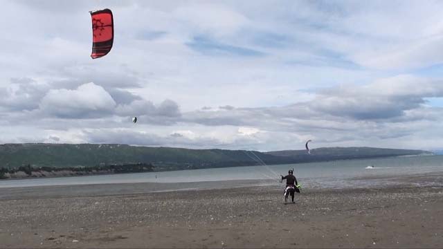 Homer, Alaska.  Clam shells will rip your kite to shreds.