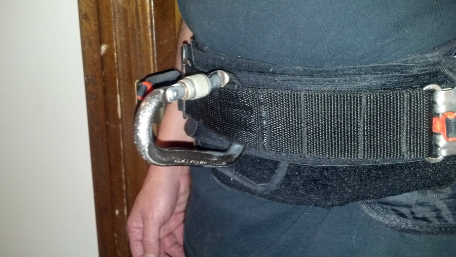 Been using this as a "sliding spreader bar" for 6 years or so. Works great. Stays tight
<br />to my torso, there's just enough friction to keep things from flopping about, it's cheap, and
<br />it's pretty bomb-proof. One piece of webbing folded over itself to make