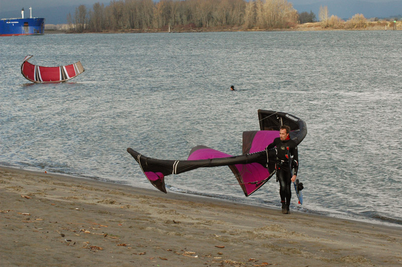 12-10-06...  Tucker had a fun, cold swim in after some underpowered 13m!