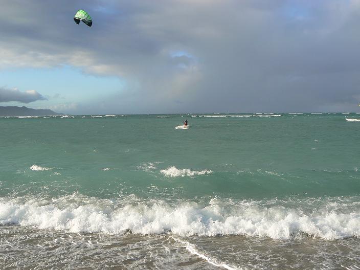 Janet showing off and catching a wave.