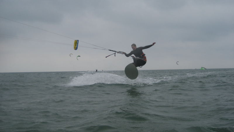 Ollie! Skimboarding is still pretty new to this kite beach, I think a lot more people are going to start riding them now.