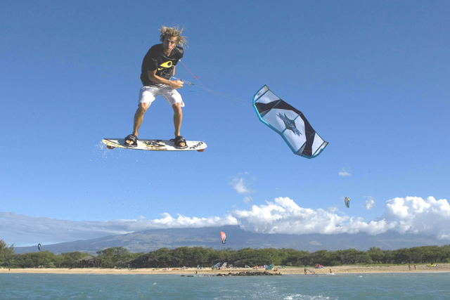 Cyril out lighting it up in front of Naish Beach in Maui.