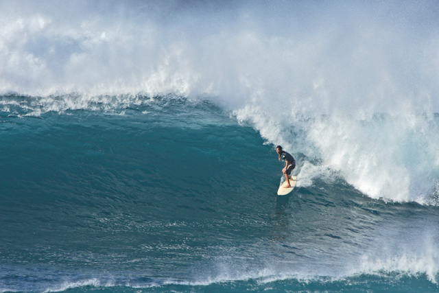 Unknown surfer charging Hookipa.