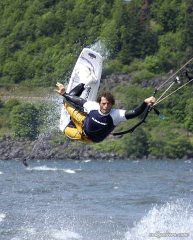 Joby reaches for the hooch @ Sand Bar - Photographer Colby Otero