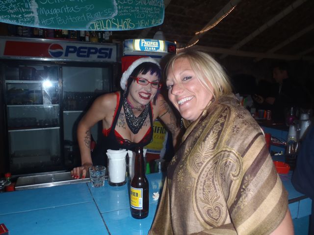 sarah drinking at "Flying High" with bartender raily
