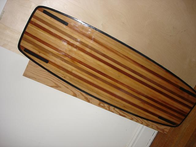 Shiny but has plenty of dust spots  
<br />-waiting to see how it rides to do any final finishing board is heavy so prob will just wet sand it...