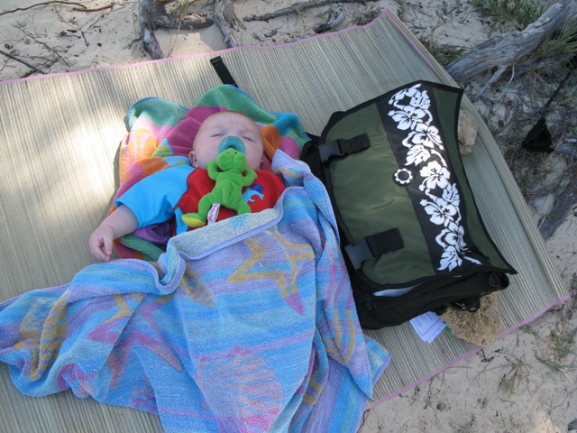 We were super lucky that Slater slept on a noisy, windy beach while we kited. :)