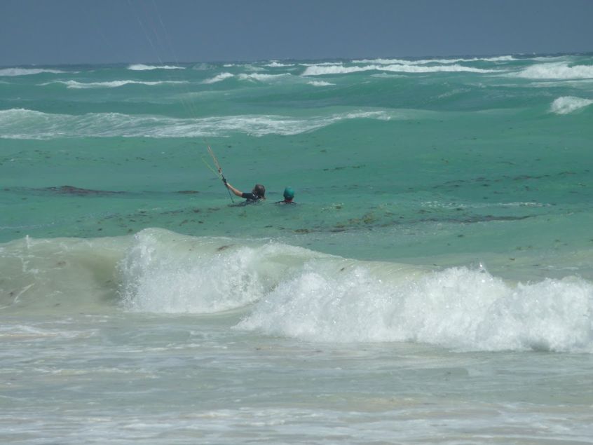 Wife taking lesson in about 12 mph winds at Tulum